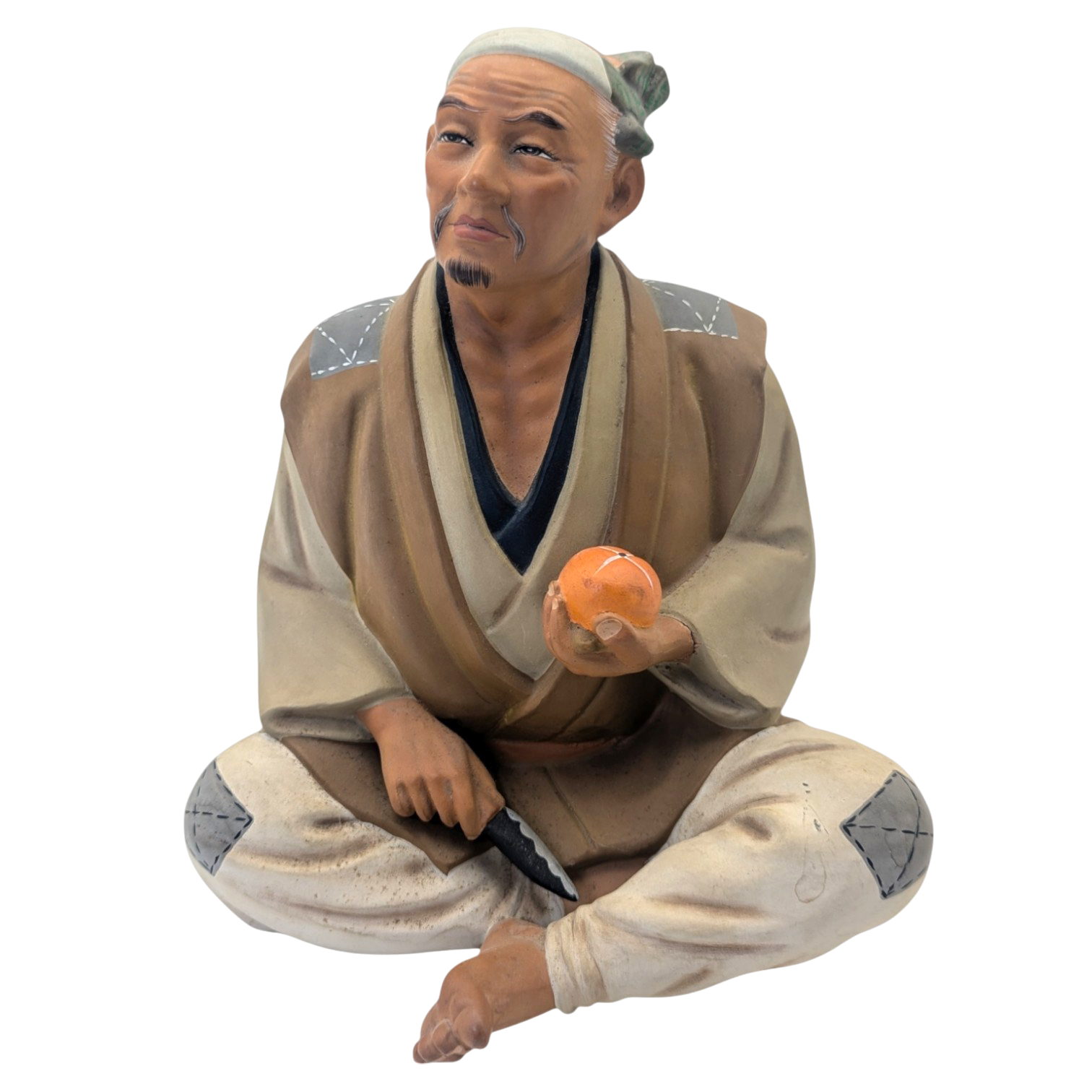 Vintage Man Slicing Orange Japanese Hakata Doll
