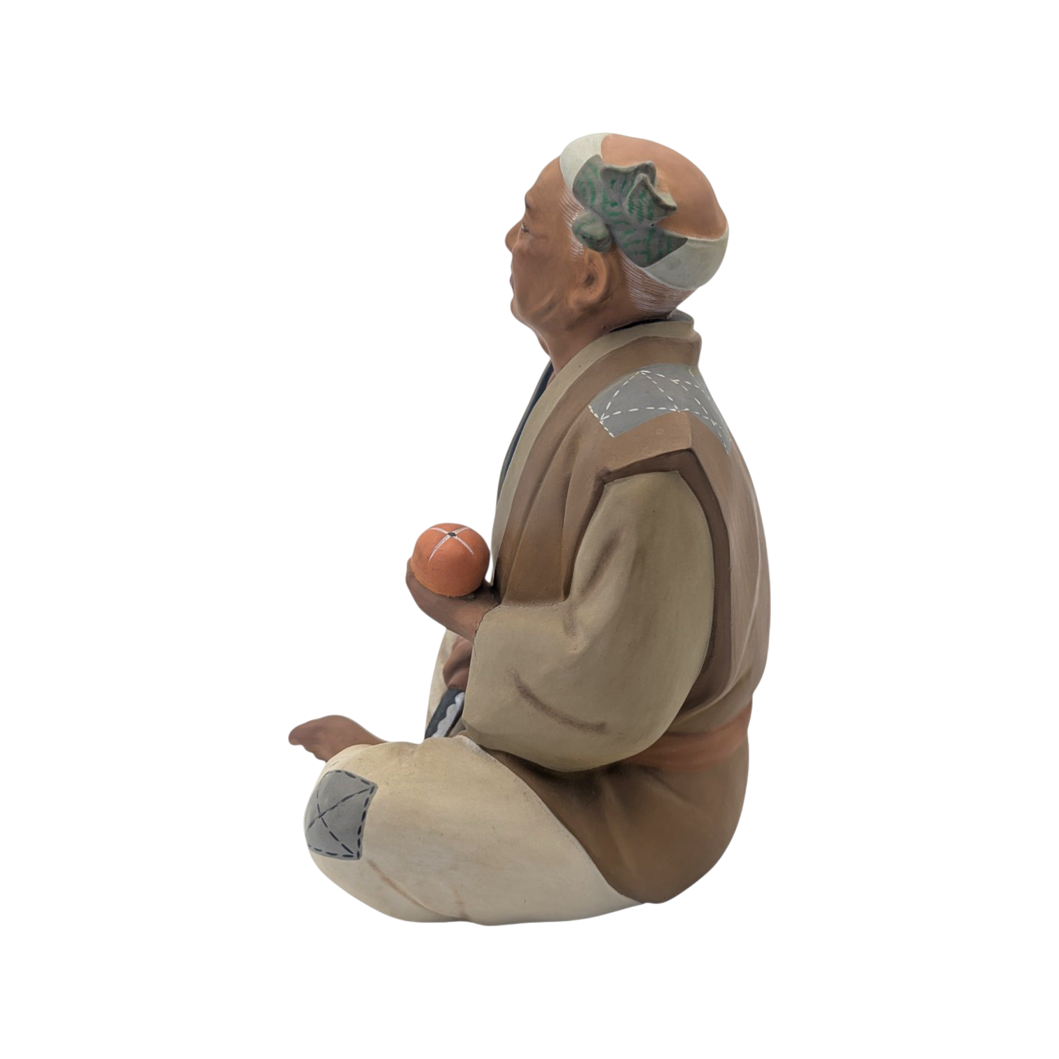 Vintage Man Slicing Orange Japanese Hakata Doll