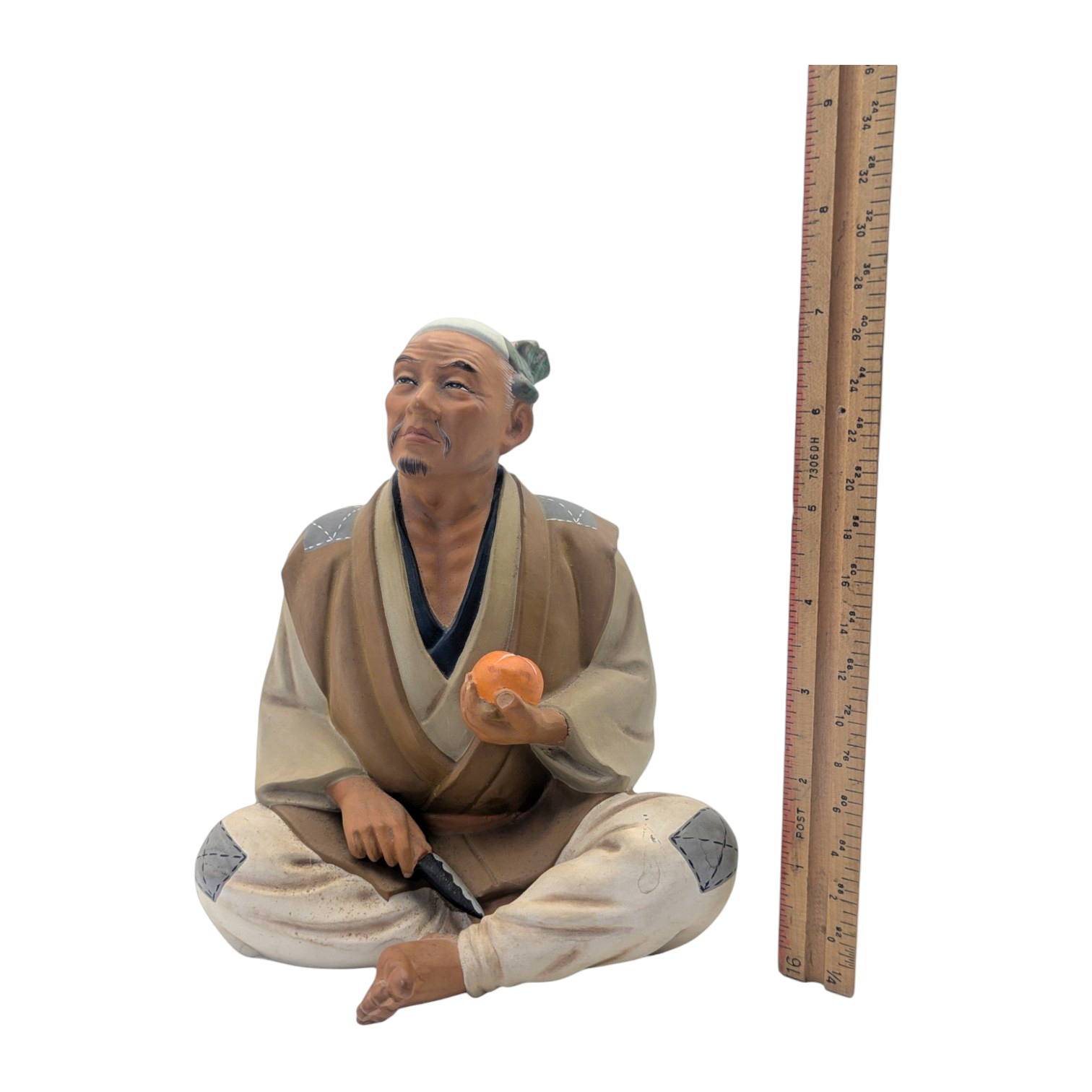 Vintage Man Slicing Orange Japanese Hakata Doll